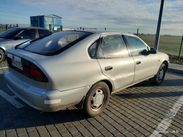 Серый Тойота Королла, объемом двигателя 1.3 л и пробегом 398 тыс. км за 1900 $, фото 6 на Automoto.ua