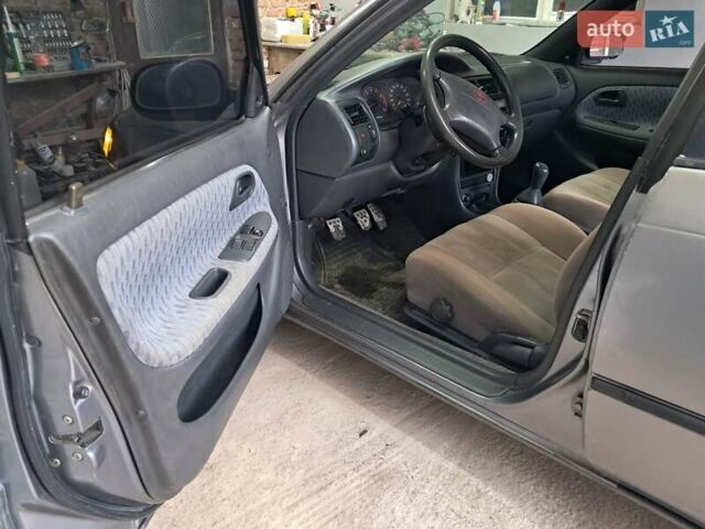 Сірий Тойота Королла, об'ємом двигуна 1.33 л та пробігом 375 тис. км за 1650 $, фото 12 на Automoto.ua