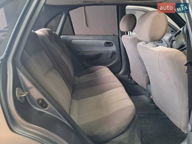 Сірий Тойота Королла, об'ємом двигуна 1.33 л та пробігом 375 тис. км за 1650 $, фото 21 на Automoto.ua