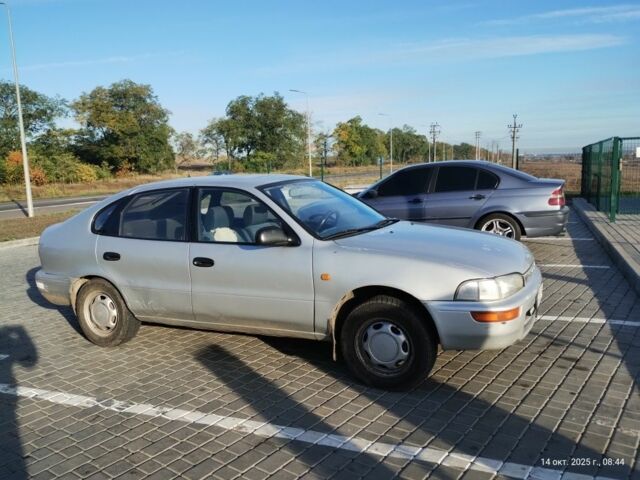 Серый Тойота Королла, объемом двигателя 1.3 л и пробегом 398 тыс. км за 1900 $, фото 2 на Automoto.ua