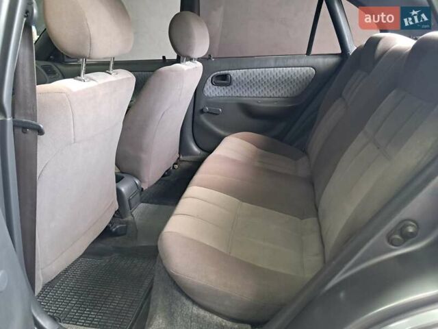 Сірий Тойота Королла, об'ємом двигуна 1.33 л та пробігом 375 тис. км за 1650 $, фото 17 на Automoto.ua