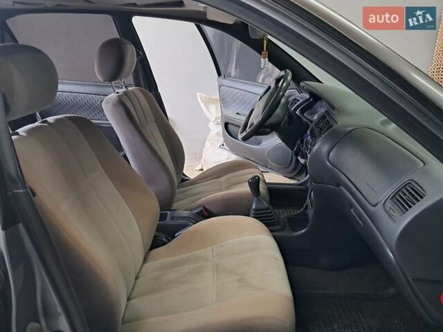 Сірий Тойота Королла, об'ємом двигуна 1.33 л та пробігом 375 тис. км за 1650 $, фото 24 на Automoto.ua