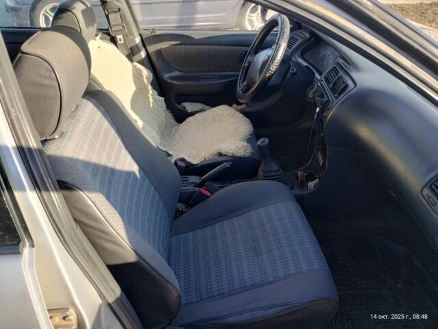 Серый Тойота Королла, объемом двигателя 1.3 л и пробегом 398 тыс. км за 1900 $, фото 9 на Automoto.ua