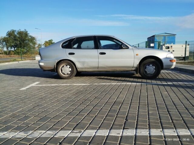 Серый Тойота Королла, объемом двигателя 1.3 л и пробегом 398 тыс. км за 1900 $, фото 7 на Automoto.ua