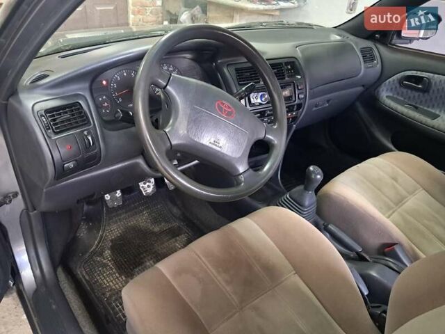 Сірий Тойота Королла, об'ємом двигуна 1.33 л та пробігом 375 тис. км за 1650 $, фото 15 на Automoto.ua