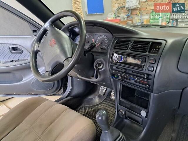 Сірий Тойота Королла, об'ємом двигуна 1.33 л та пробігом 375 тис. км за 1650 $, фото 26 на Automoto.ua