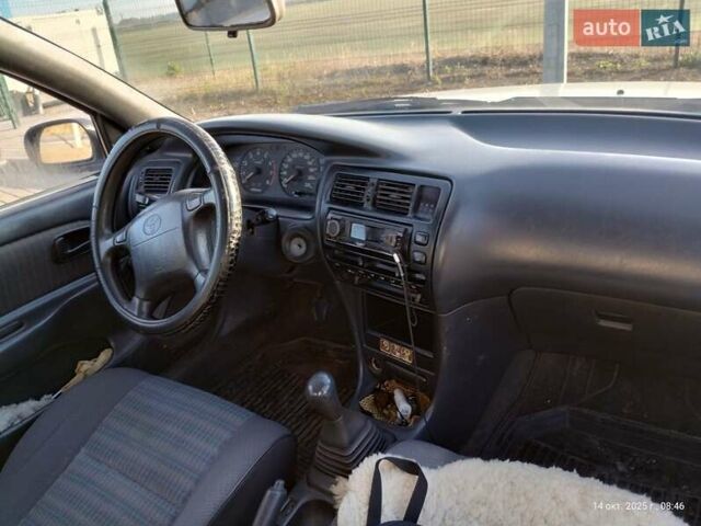 Серый Тойота Королла, объемом двигателя 1.33 л и пробегом 398 тыс. км за 1999 $, фото 8 на Automoto.ua