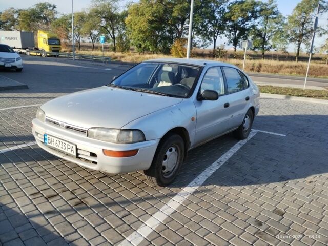 Серый Тойота Королла, объемом двигателя 1.3 л и пробегом 398 тыс. км за 1900 $, фото 1 на Automoto.ua