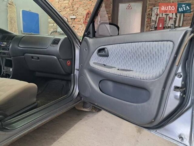 Сірий Тойота Королла, об'ємом двигуна 1.33 л та пробігом 375 тис. км за 1650 $, фото 22 на Automoto.ua