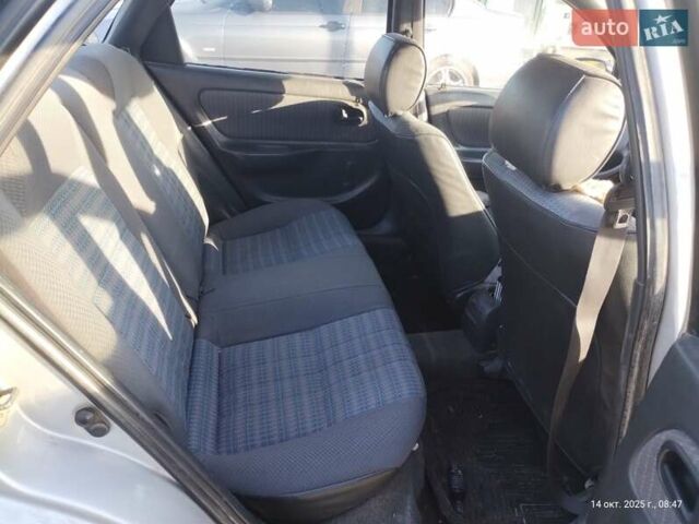 Серый Тойота Королла, объемом двигателя 1.33 л и пробегом 398 тыс. км за 1999 $, фото 2 на Automoto.ua