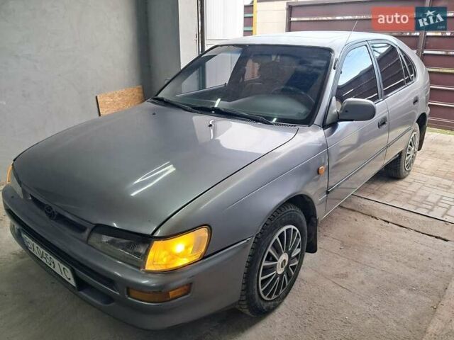 Сірий Тойота Королла, об'ємом двигуна 1.33 л та пробігом 375 тис. км за 1650 $, фото 4 на Automoto.ua