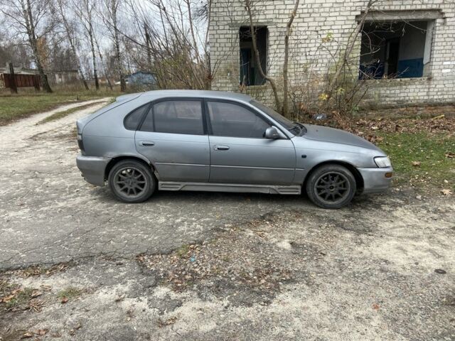 Серый Тойота Королла, объемом двигателя 1.3 л и пробегом 500 тыс. км за 800 $, фото 4 на Automoto.ua