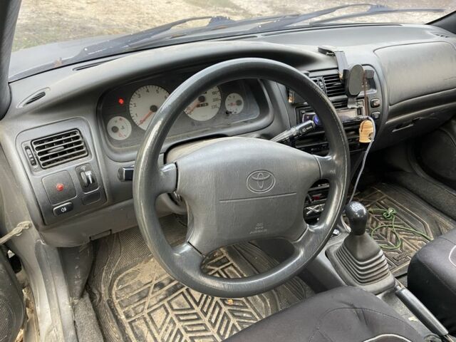 Серый Тойота Королла, объемом двигателя 1.3 л и пробегом 500 тыс. км за 800 $, фото 1 на Automoto.ua