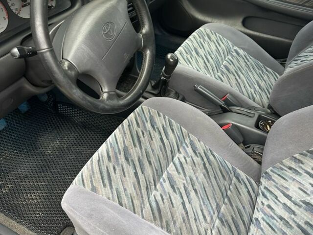 Серый Тойота Королла, объемом двигателя 1.3 л и пробегом 300 тыс. км за 3200 $, фото 8 на Automoto.ua