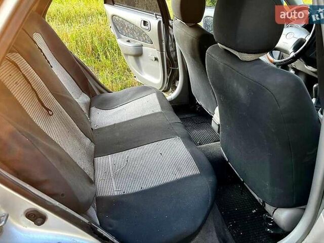 Серый Тойота Королла, объемом двигателя 1.6 л и пробегом 337 тыс. км за 2200 $, фото 7 на Automoto.ua