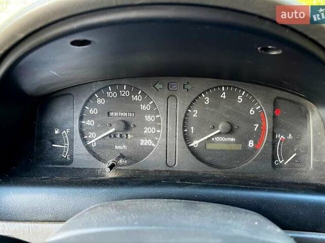 Серый Тойота Королла, объемом двигателя 1.6 л и пробегом 337 тыс. км за 2200 $, фото 6 на Automoto.ua