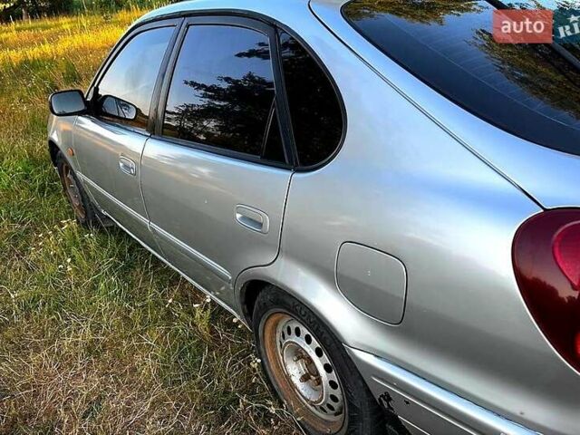 Серый Тойота Королла, объемом двигателя 1.6 л и пробегом 337 тыс. км за 2200 $, фото 4 на Automoto.ua