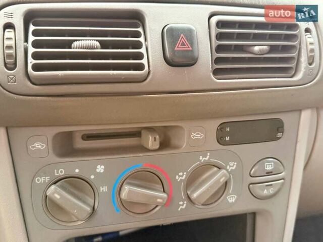 Серый Тойота Королла, объемом двигателя 1.33 л и пробегом 70 тыс. км за 2800 $, фото 22 на Automoto.ua