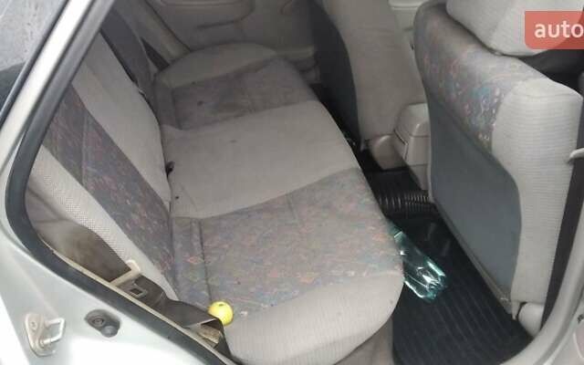 Серый Тойота Королла, объемом двигателя 1.33 л и пробегом 300 тыс. км за 2600 $, фото 9 на Automoto.ua