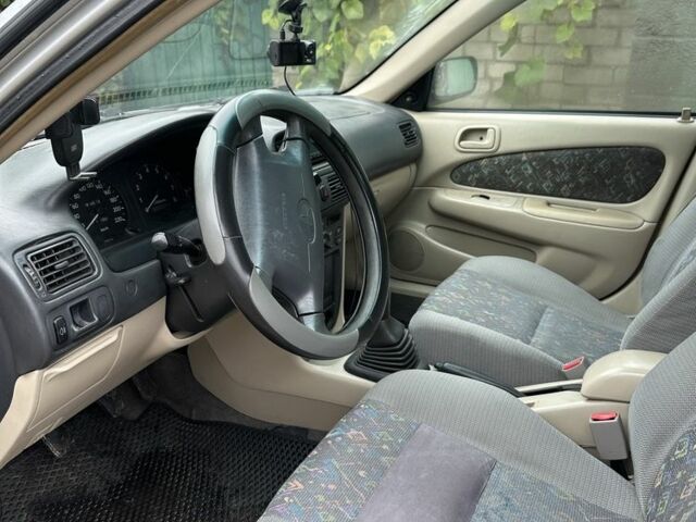 Серый Тойота Королла, объемом двигателя 1.6 л и пробегом 277 тыс. км за 3100 $, фото 4 на Automoto.ua