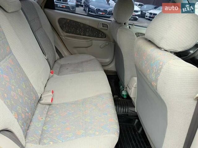 Серый Тойота Королла, объемом двигателя 1.33 л и пробегом 70 тыс. км за 2800 $, фото 14 на Automoto.ua