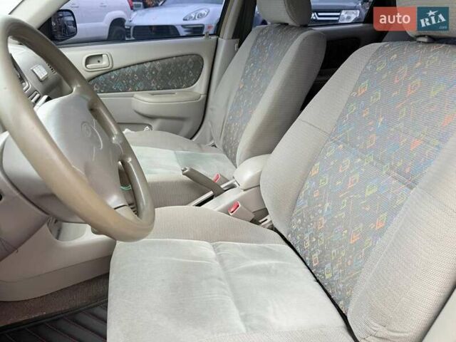 Серый Тойота Королла, объемом двигателя 1.33 л и пробегом 70 тыс. км за 2800 $, фото 13 на Automoto.ua