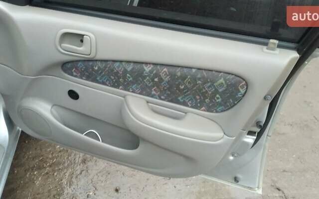 Серый Тойота Королла, объемом двигателя 1.33 л и пробегом 300 тыс. км за 2600 $, фото 11 на Automoto.ua