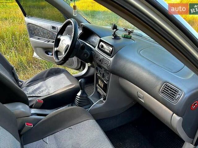 Серый Тойота Королла, объемом двигателя 1.6 л и пробегом 337 тыс. км за 2200 $, фото 9 на Automoto.ua