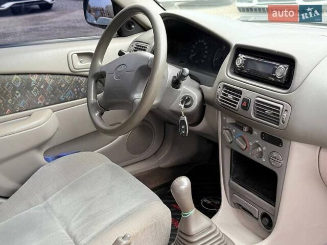 Серый Тойота Королла, объемом двигателя 1.33 л и пробегом 70 тыс. км за 2800 $, фото 19 на Automoto.ua