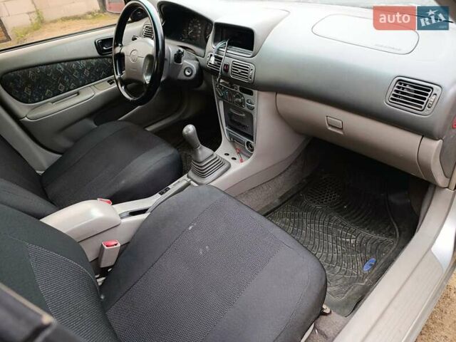 Серый Тойота Королла, объемом двигателя 1.59 л и пробегом 280 тыс. км за 1350 $, фото 1 на Automoto.ua