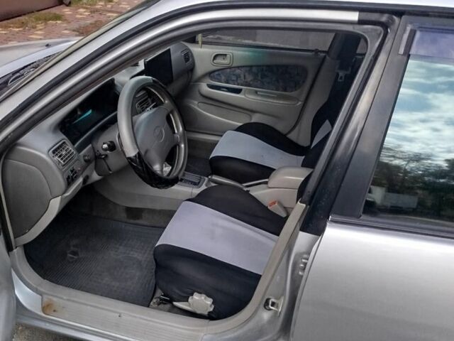 Сірий Тойота Королла, об'ємом двигуна 1.6 л та пробігом 250 тис. км за 3000 $, фото 5 на Automoto.ua