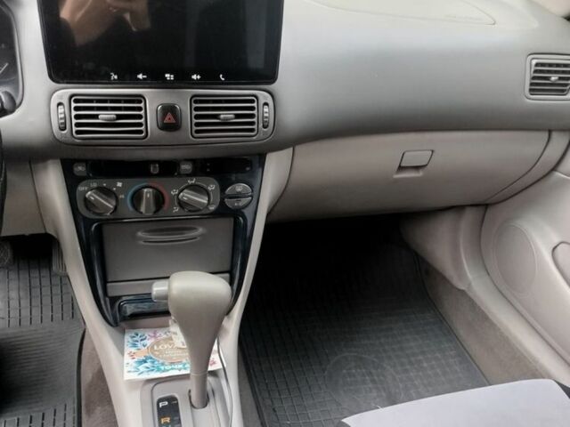 Сірий Тойота Королла, об'ємом двигуна 1.6 л та пробігом 250 тис. км за 3000 $, фото 4 на Automoto.ua