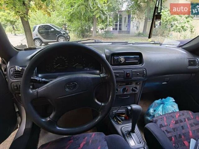 Серый Тойота Королла, объемом двигателя 1.59 л и пробегом 265 тыс. км за 3750 $, фото 7 на Automoto.ua