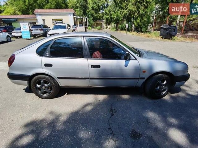 Серый Тойота Королла, объемом двигателя 1.59 л и пробегом 265 тыс. км за 3750 $, фото 2 на Automoto.ua