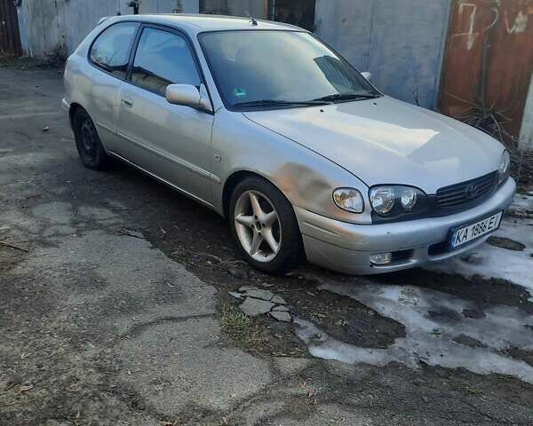 Серый Тойота Королла, объемом двигателя 2 л и пробегом 310 тыс. км за 2450 $, фото 2 на Automoto.ua