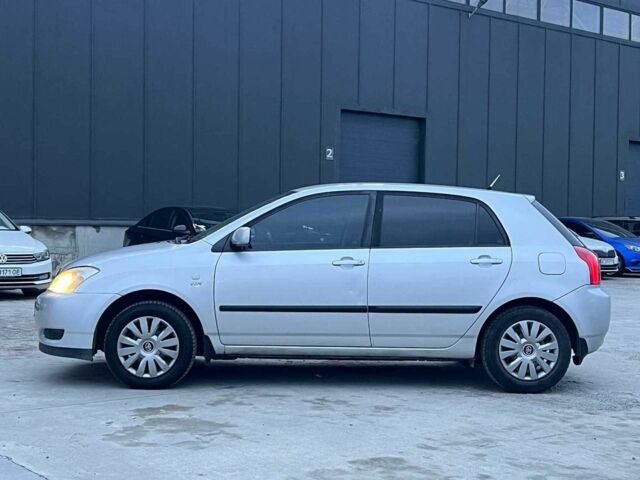 Сірий Тойота Королла, об'ємом двигуна 1.4 л та пробігом 253 тис. км за 4540 $, фото 3 на Automoto.ua