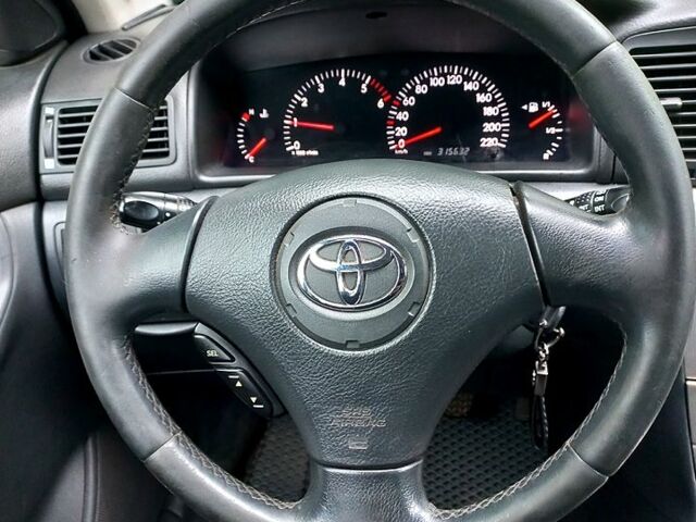 Серый Тойота Королла, объемом двигателя 2 л и пробегом 320 тыс. км за 3700 $, фото 5 на Automoto.ua