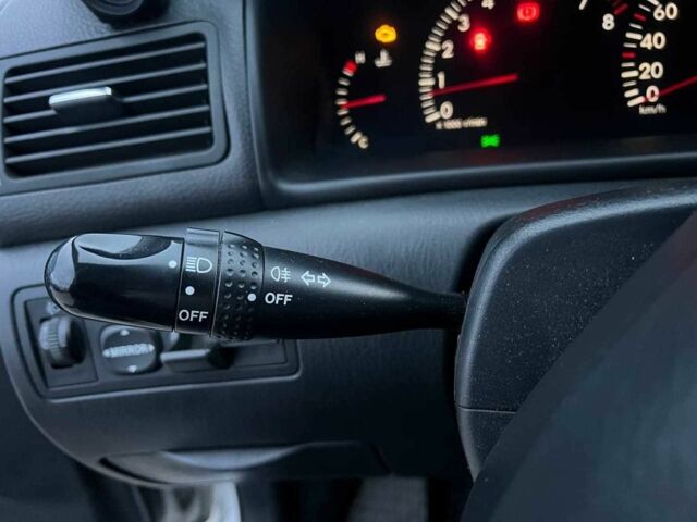 Сірий Тойота Королла, об'ємом двигуна 1.4 л та пробігом 253 тис. км за 4540 $, фото 23 на Automoto.ua