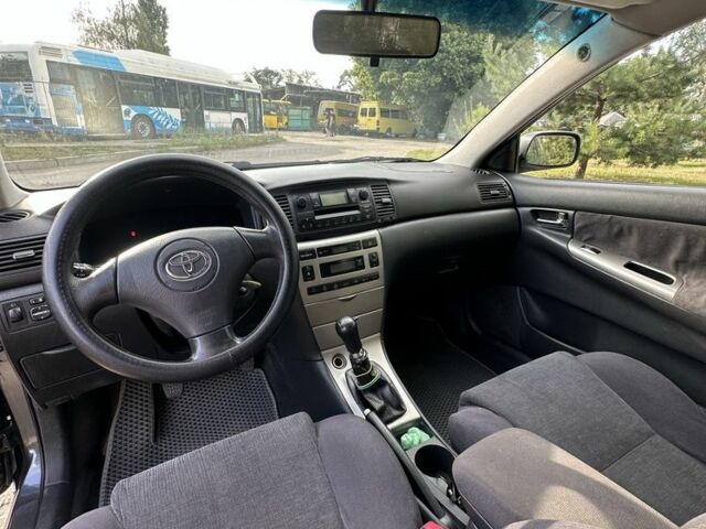 Серый Тойота Королла, объемом двигателя 2 л и пробегом 299 тыс. км за 3999 $, фото 5 на Automoto.ua