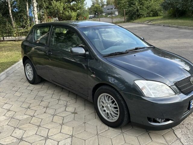 Серый Тойота Королла, объемом двигателя 2 л и пробегом 299 тыс. км за 3999 $, фото 2 на Automoto.ua