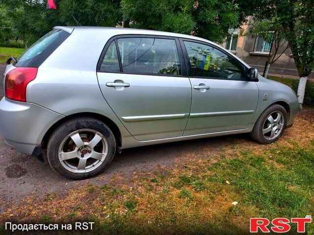 Серый Тойота Королла, объемом двигателя 2 л и пробегом 320 тыс. км за 3700 $, фото 4 на Automoto.ua