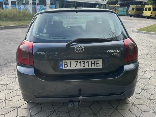 Серый Тойота Королла, объемом двигателя 2 л и пробегом 299 тыс. км за 3999 $, фото 3 на Automoto.ua