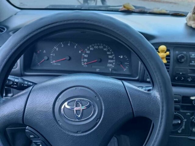 Серый Тойота Королла, объемом двигателя 2 л и пробегом 380 тыс. км за 1908 $, фото 1 на Automoto.ua