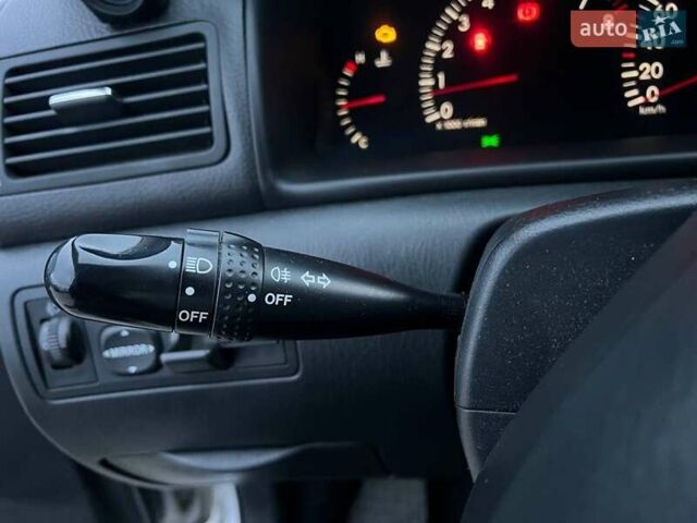 Сірий Тойота Королла, об'ємом двигуна 1.4 л та пробігом 253 тис. км за 4540 $, фото 23 на Automoto.ua