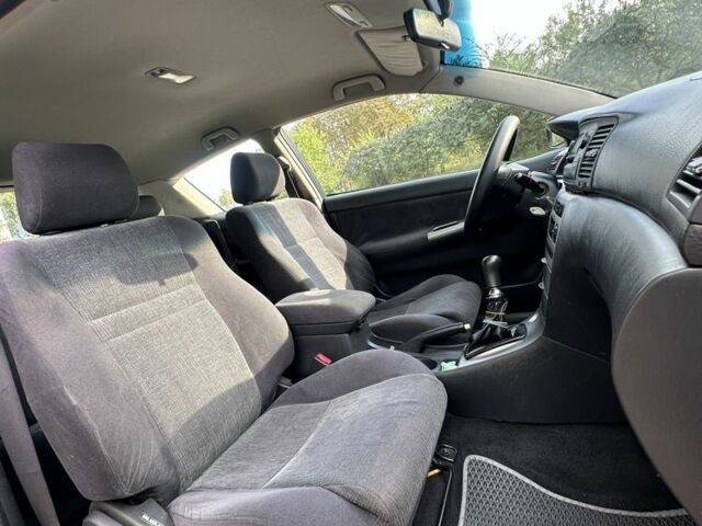 Серый Тойота Королла, объемом двигателя 2 л и пробегом 299 тыс. км за 3999 $, фото 9 на Automoto.ua