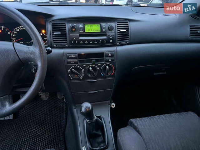 Сірий Тойота Королла, об'ємом двигуна 1.4 л та пробігом 253 тис. км за 4540 $, фото 24 на Automoto.ua