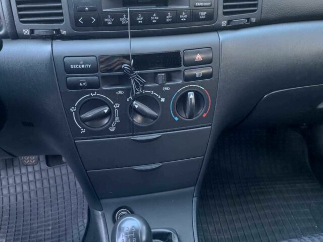 Серый Тойота Королла, объемом двигателя 2 л и пробегом 380 тыс. км за 1908 $, фото 4 на Automoto.ua