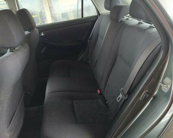 Серый Тойота Королла, объемом двигателя 1.6 л и пробегом 315 тыс. км за 4200 $, фото 11 на Automoto.ua