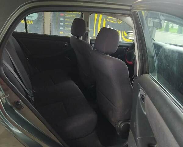 Серый Тойота Королла, объемом двигателя 1.6 л и пробегом 315 тыс. км за 4200 $, фото 9 на Automoto.ua