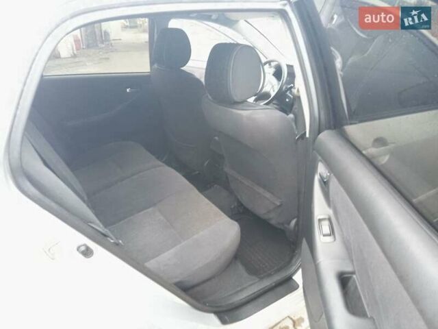 Сірий Тойота Королла, об'ємом двигуна 2 л та пробігом 290 тис. км за 4200 $, фото 9 на Automoto.ua
